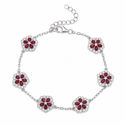 Sterling Silver Floral Bracelet – Ruby-Red Stones & Moissanite Accents