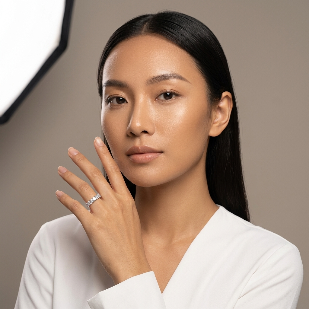Fashion model wearing Velara Milano moissanite ring, studio shoot