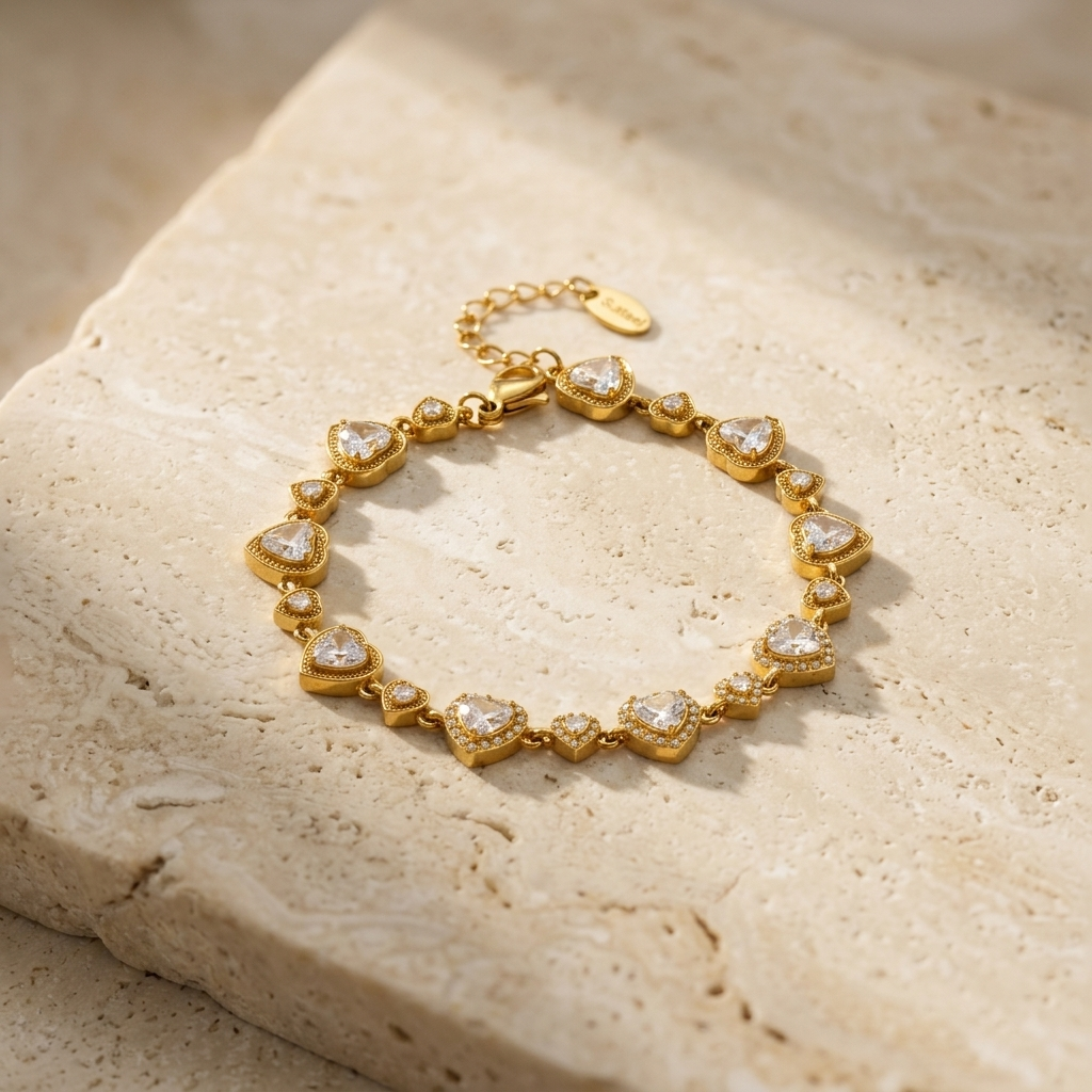 Crystal Heart Charm Bracelet - Product on Travertine